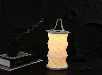 Folding lamp with handle