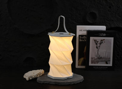 Folding lamp with handle