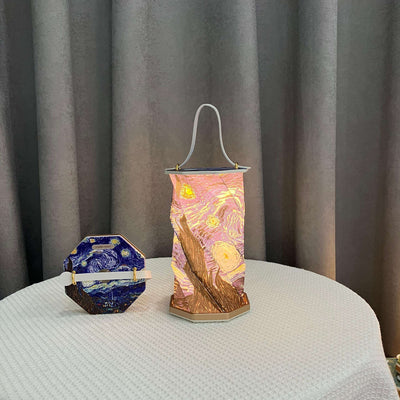 Folding lamp with handle